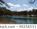 "Lake Ruri" in Goshikinuma and Mt. Bandai with snow in the back 90256531