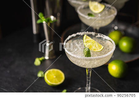 Margarita cocktail with lime Margarita cocktail with lime 90256705