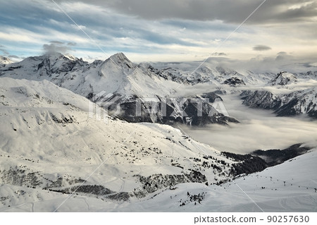 Mountain winter landscape above clouds Mountain winter landscape above clouds 90257630