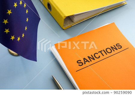 EU flag and sanctions list with a folder. 90259090