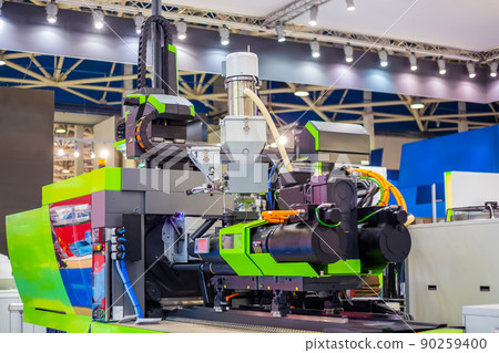 Automatic plastic injection molding machine during work at exhibition 90259400