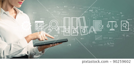 Compliance theme with business woman using a tablet 90259602
