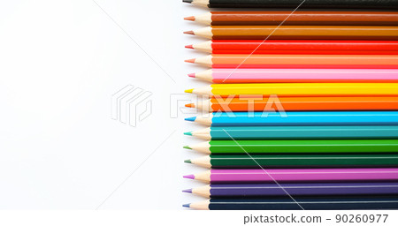A set of colored pencils isolated on a white background in banner format. Place for text A set of colored pencils isolated on a white background in banner format. Place for text 90260977