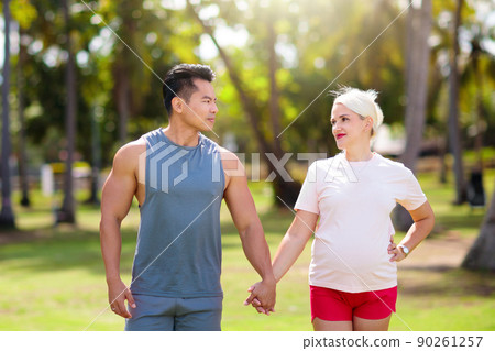 Pregnant woman. Interracial couple expecting baby. 90261257