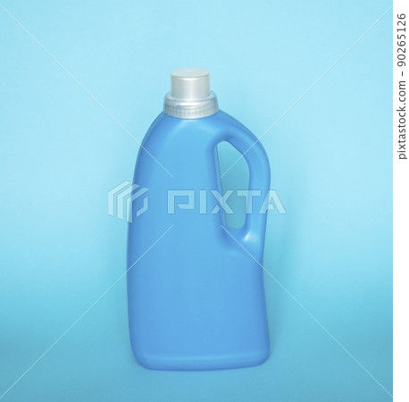 Big Blue plastic bottles of cleaning products isolated on blue background. Mock up. Product design. 90265126