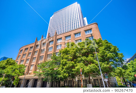 Tokyo cityscape of Japan, looking at the Ministry of Education, Culture, Sports, Science and Technology of Kasumigaseki that shines in the fresh green and blue sky 90267470