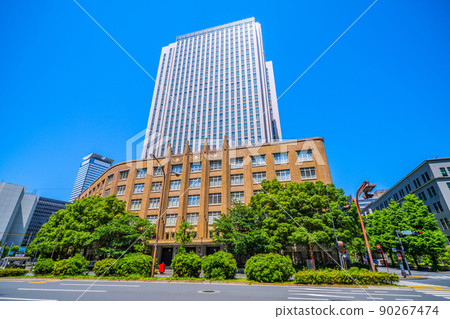 Tokyo cityscape of Japan, looking at the Ministry of Education, Culture, Sports, Science and Technology of Kasumigaseki that shines in the fresh green and blue sky 90267474