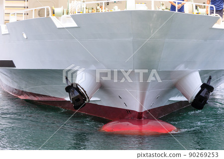 Bulbous bow and anchor on the bow of the ferry entering the port 90269253