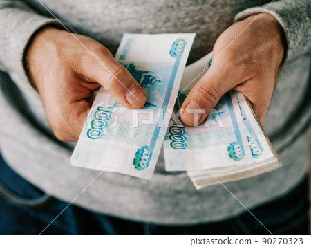 Hands counting rubles 90270323