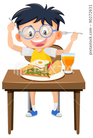 Happy boy enjoy eating food on table Happy boy enjoy eating food on table 90272631