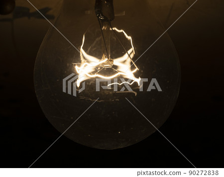 light bulb lamp detail close up isolated on black background 90272838