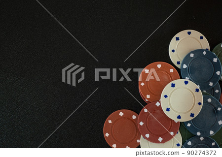 Casino Chip or Poker Chip on Gambling Poker Black Table Casino Chip or Poker Chip on Gambling Poker Black Table 90274372