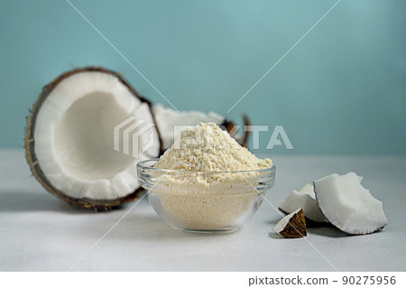 Coconut flour and coconut nut, gluten free flour,healthy alternative, healthy lifestyle concept Coconut flour and coconut nut, gluten free flour,healthy alternative, healthy lifestyle concept 90275956
