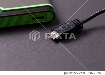 Hard disk on a black isolated background close-up. Hard disk on a black isolated background close-up. 90276268