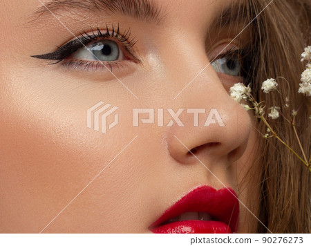 Beauty Face. Beautiful Woman With Sexy Full Red Lips. Closeup Portrait Of Girl With Healthy Smooth Facial Skin Applying Lip Balm On Lip. High Resolution. cosmetology, make up, injections, spa Beauty Face. Beautiful Woman With Sexy Full Red Lips. Closeup Portrait Of Girl With Healthy Smooth Facial Skin Applying Lip Balm On Lip. High Resolution. cosmetology, make up, injections, spa 90276273