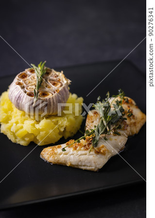 cod fillet with couscous and roasted garlic cod fillet with couscous and roasted garlic 90276341
