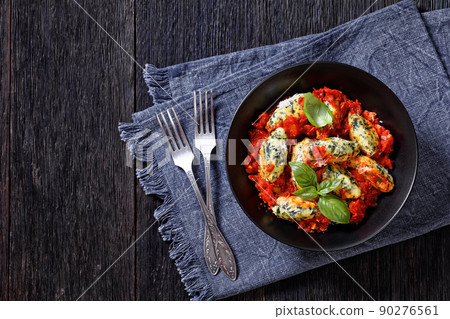 Malfatti, hot Italian spinach ricotta dumplings Malfatti, hot Italian spinach ricotta dumplings 90276561