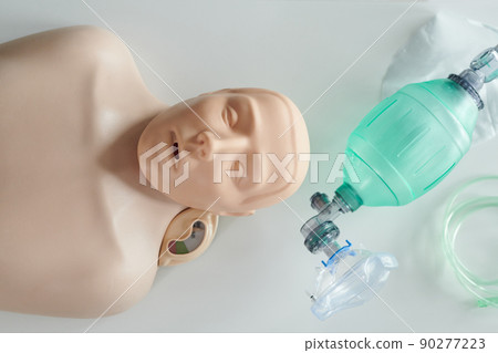 High angle view of training dummy and oxygen mask used by paramedic trainees High angle view of training dummy and oxygen mask used by paramedic trainees 90277223