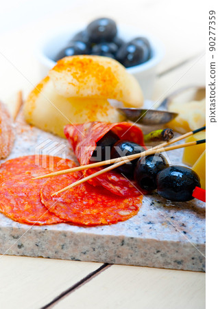 mix cold cut on a stone with fresh pears mix cold cut on a stone with fresh pears 90277359