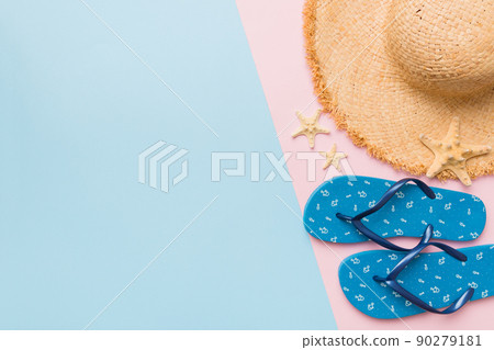 Summer vacation concept flat lay. straw hat beach accessories and flip flop top view. Space for text. travel concept Summer vacation concept flat lay. straw hat beach accessories and flip flop top view. Space for text. travel concept 90279181