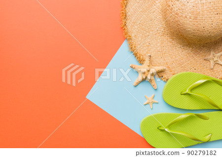 Summer vacation concept flat lay. straw hat beach accessories and flip flop top view. Space for text. travel concept Summer vacation concept flat lay. straw hat beach accessories and flip flop top view. Space for text. travel concept 90279182