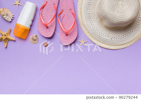 Summer vacation concept flat lay. straw hat beach accessories and towel top view. Space for text. travel concept Summer vacation concept flat lay. straw hat beach accessories and towel top view. Space for text. travel concept 90279244