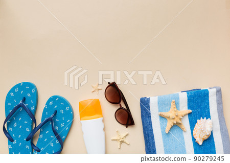 Summer vacation concept flat lay. beach accessories and towel top view. Space for text. travel concept 90279245
