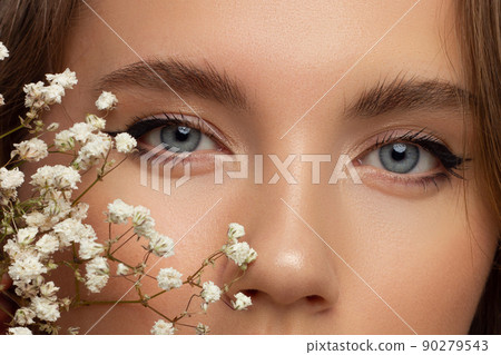 Beautiful macro shot of female eye with classic eyeliner makeup. Perfect shape of eyebrows, brown eyeshadows and long eyelashes. Cosmetics and make-up. Closeup macro shot of fashion liner eyes visage Beautiful macro shot of female eye with classic eyeliner makeup. Perfect shape of eyebrows, brown eyeshadows and long eyelashes. Cosmetics and make-up. Closeup macro shot of fashion liner eyes visage 90279543