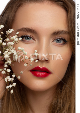 Evening style. Alluring woman with luxury fashion make-up, red lips makeup and long hair. Trends colors, marsala wine color lipstick, strong eyebrows, sexy hair. cosmetology, make up, injections, spa 90279544