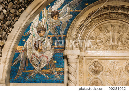 Close up details of mosaic panels depicting flying seraphim in chapel-tomb of Paskevich (1870-1889 Years) in city park. Famous local landmark Gomel, Belarus. Rumyantsevs and Paskeviches park 90281012