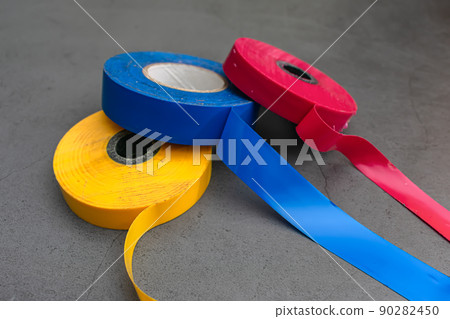 Three pieces of insulating adhesive tape in three colors Three pieces of insulating adhesive tape in three colors 90282450