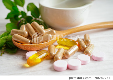 Alternative medicine herbal organic capsule with vitamin E omega 3 fish oil, mineral, drug with herbs leaf natural supplements for healthy good life. Alternative medicine herbal organic capsule with vitamin E omega 3 fish oil, mineral, drug with herbs leaf natural supplements for healthy good life. 90282755