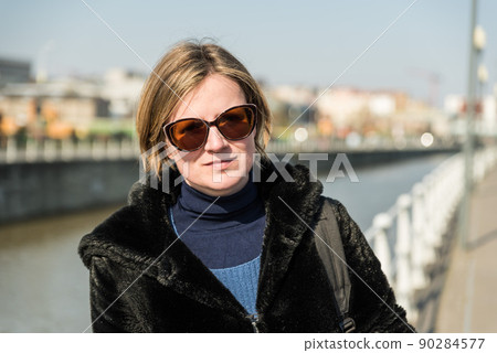 Attractive thirty year old woman posing at the Brussels canal Attractive thirty year old woman posing at the Brussels canal 90284577