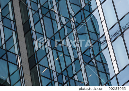 Schaerbeek, Brussels Capital Region - Belgium - 02 20 2020 Reflecting patterns of the blue office windows at the Engie headquarters 90285063