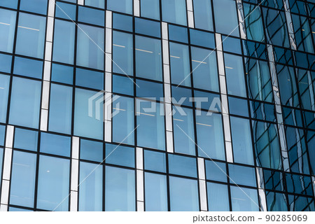 Schaerbeek, Brussels Capital Region - Belgium - 02 20 2020 Reflecting patterns of the blue office windows at the Engie headquarters Schaerbeek, Brussels Capital Region - Belgium - 02 20 2020 Reflecting patterns of the blue office windows at the Engie headquarters 90285069