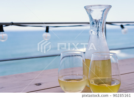 Slowly white wine on the terrace Slowly white wine on the terrace 90285161