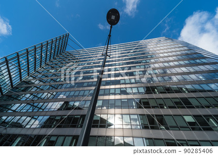 Brussels European District, Brussels Capital Region - Belgium - Low angle view of the contemporary staff entrance of a building of the European Commission Brussels European District, Brussels Capital Region - Belgium - Low angle view of the contemporary staff entrance of a building of the European Commission 90285406