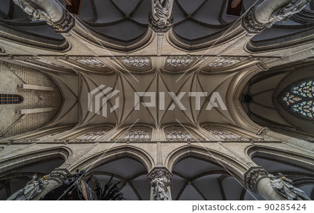 Brussels Old Town, Brussels Capital Region - Belgium - Symmetric gothic ceiling of the catholic Chapel church Brussels Old Town, Brussels Capital Region - Belgium - Symmetric gothic ceiling of the catholic Chapel church 90285424