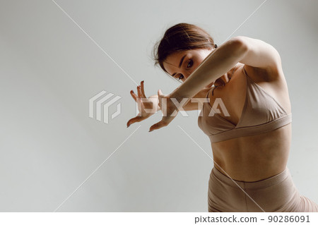 Young woman dancer dancing high heels dance Young woman dancer dancing high heels dance 90286091