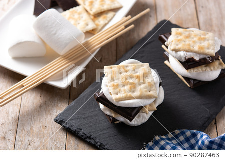 Homemade smores on wooden table. typical American sweet Homemade smores on wooden table. typical American sweet 90287463