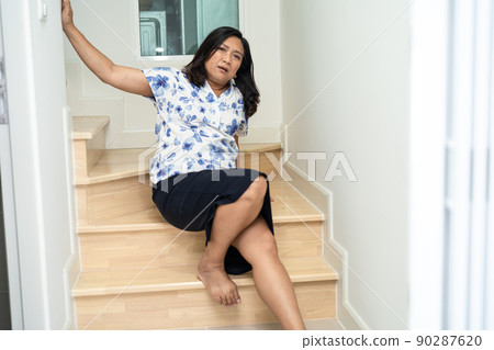 Asian lady woman patient fall down the stairs because slippery surfaces 90287620