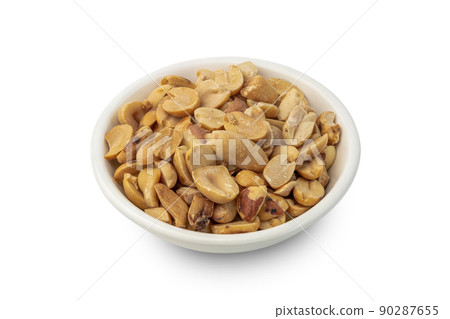 Roasted groundnut in white bowl isolated on white background with clipping path 90287655