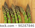 Vegetarian fresh green asparagus. vegetable on wood 90287846
