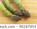 Vegetarian fresh green asparagus. vegetable on wood 90287854