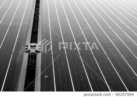 Side support bracked between solar panels on a new installation on a residential roof Side support bracked between solar panels on a new installation on a residential roof 90287984