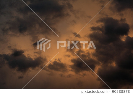 sunset - view of cloudy sky at setting sun 90288878