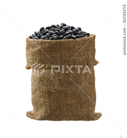Raw black beans in sack isolated on white background. Raw black beans in sack isolated on white background. 90289258