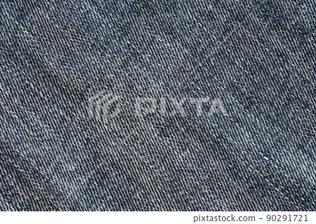 Detailed abstract texture of dark blue denim cloth. Background image of old used denim trousers fabric 90291721