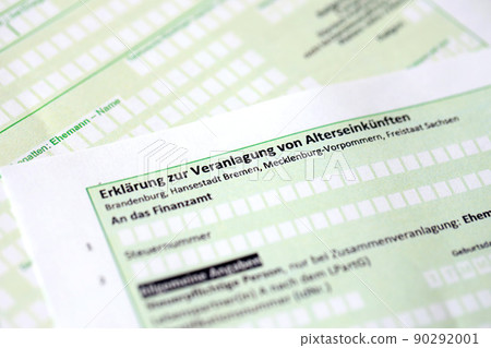German statement on the assessment of retirement income close up. The concept of taxation and accountant paperwork Germany German statement on the assessment of retirement income close up. The concept of taxation and accountant paperwork Germany 90292001