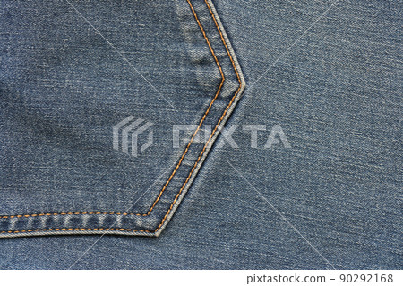 Detailed abstract texture of dark blue denim cloth. Background image of old used denim trousers fabric Detailed abstract texture of dark blue denim cloth. Background image of old used denim trousers fabric 90292168